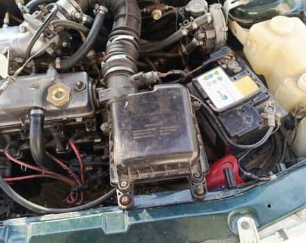 Зеленый ВАЗ 2112, объемом двигателя 1.5 л и пробегом 180 тыс. км за 1300 $, фото 1 на Automoto.ua