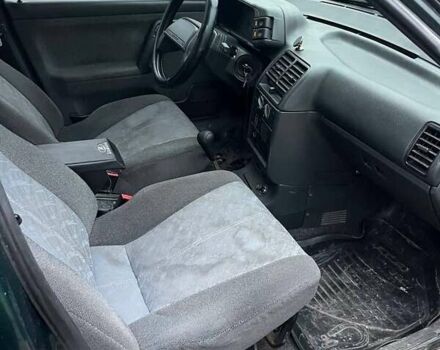 Зеленый ВАЗ 2112, объемом двигателя 1.6 л и пробегом 147 тыс. км за 1900 $, фото 4 на Automoto.ua