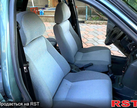 ВАЗ 2112 2007 в Первомайск на Automoto.ua Зеленый ВАЗ 2112, объемом двигателя 1.6 л и пробегом 200 тыс. км за 3200 $, фото 11 на Automoto.ua