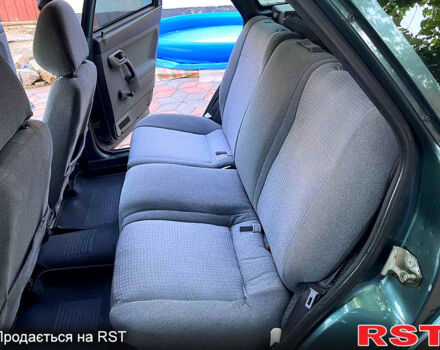 ВАЗ 2112 2007 в Первомайск на Automoto.ua Зеленый ВАЗ 2112, объемом двигателя 1.6 л и пробегом 200 тыс. км за 3200 $, фото 8 на Automoto.ua