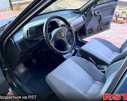 ВАЗ 2112 2007 в Первомайск на Automoto.ua Зеленый ВАЗ 2112, объемом двигателя 1.6 л и пробегом 200 тыс. км за 3200 $, фото 9 на Automoto.ua