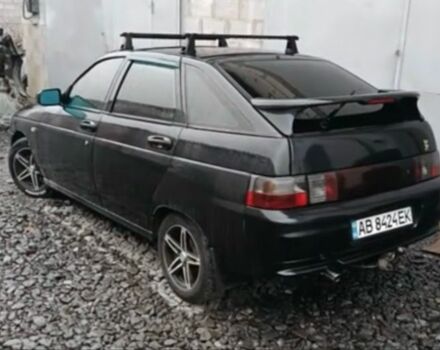 Чорний ВАЗ 21124, об'ємом двигуна 1.6 л та пробігом 245 тис. км за 1999 $, фото 1 на Automoto.ua
