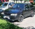 Черный ВАЗ 2113 Самара, объемом двигателя 1.57 л и пробегом 150 тыс. км за 1100 $, фото 1 на Automoto.ua