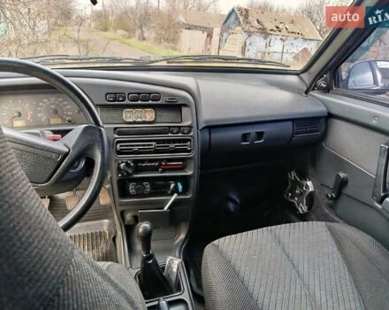 Чорний ВАЗ 2113 Самара, об'ємом двигуна 1.6 л та пробігом 210 тис. км за 1900 $, фото 4 на Automoto.ua