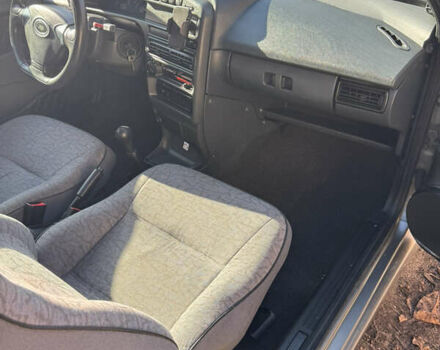 Серый ВАЗ 2113 Самара, объемом двигателя 1.6 л и пробегом 162 тыс. км за 1900 $, фото 14 на Automoto.ua