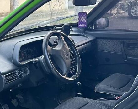 Зелений ВАЗ 2113 Самара, об'ємом двигуна 1.5 л та пробігом 161 тис. км за 1950 $, фото 4 на Automoto.ua