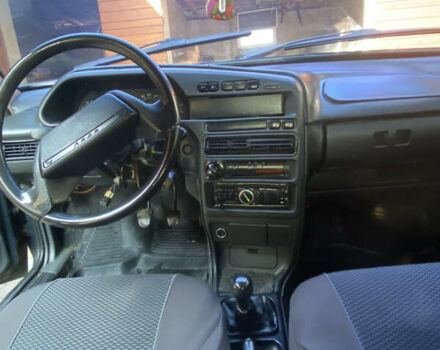 Зеленый ВАЗ 2114 Самара, объемом двигателя 1.6 л и пробегом 233 тыс. км за 1250 $, фото 9 на Automoto.ua