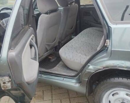 Зелений ВАЗ 2114 Самара, об'ємом двигуна 1.6 л та пробігом 165 тис. км за 1599 $, фото 12 на Automoto.ua