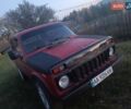 Красный ВАЗ 2121 Нива, объемом двигателя 1.6 л и пробегом 200 тыс. км за 1999 $, фото 1 на Automoto.ua