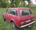 Красный ВАЗ 2121 Нива, объемом двигателя 1.57 л и пробегом 236 тыс. км за 1350 $, фото 1 на Automoto.ua