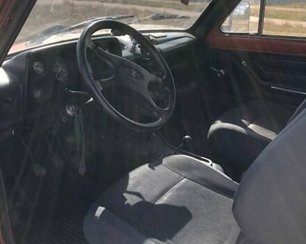 Красный ВАЗ 2121 Нива, объемом двигателя 1.6 л и пробегом 123 тыс. км за 1300 $, фото 11 на Automoto.ua