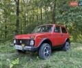 Красный ВАЗ 2121 Нива, объемом двигателя 1.6 л и пробегом 200 тыс. км за 1350 $, фото 1 на Automoto.ua