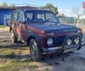 Красный ВАЗ 2121 Нива, объемом двигателя 1.57 л и пробегом 200 тыс. км за 1000 $, фото 1 на Automoto.ua