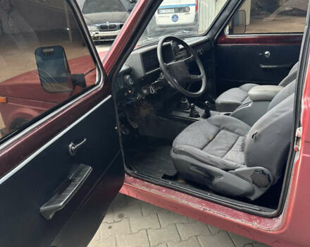 Красный ВАЗ 2121 Нива, объемом двигателя 1.6 л и пробегом 168 тыс. км за 1850 $, фото 9 на Automoto.ua