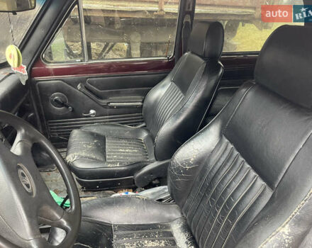 Красный ВАЗ 2121 Нива, объемом двигателя 1.57 л и пробегом 250 тыс. км за 1300 $, фото 4 на Automoto.ua
