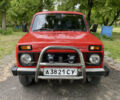 Красный ВАЗ 2121 Нива, объемом двигателя 1.6 л и пробегом 100 тыс. км за 2650 $, фото 1 на Automoto.ua