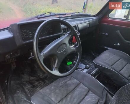 Красный ВАЗ 2121 Нива, объемом двигателя 1.58 л и пробегом 144 тыс. км за 1550 $, фото 1 на Automoto.ua