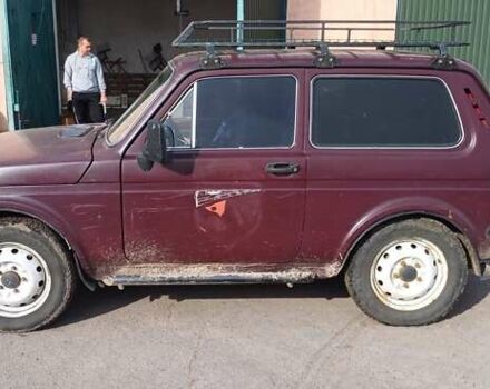 Красный ВАЗ 2121 Нива, объемом двигателя 1.6 л и пробегом 270 тыс. км за 1400 $, фото 2 на Automoto.ua