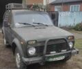 Червоний ВАЗ 2121 Нива, об'ємом двигуна 1.6 л та пробігом 180 тис. км за 2412 $, фото 1 на Automoto.ua
