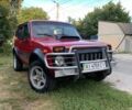 Красный ВАЗ 2121 Нива, объемом двигателя 1.7 л и пробегом 105 тыс. км за 3300 $, фото 1 на Automoto.ua