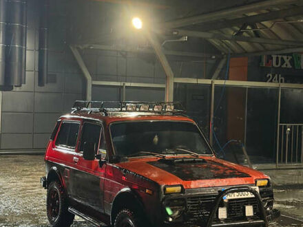 Красный ВАЗ 2121 Нива, объемом двигателя 1.57 л и пробегом 100 тыс. км за 1999 $, фото 1 на Automoto.ua