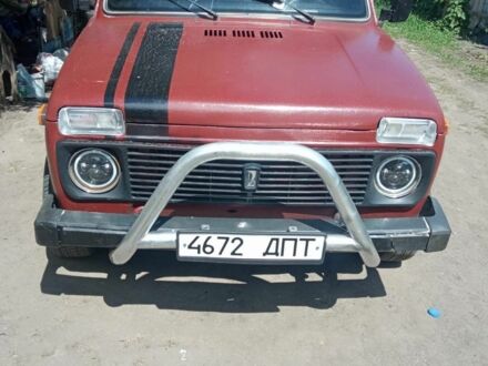 Красный ВАЗ 2121 Нива, объемом двигателя 1.6 л и пробегом 4 тыс. км за 1155 $, фото 1 на Automoto.ua