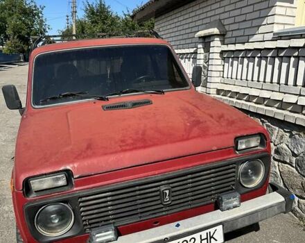 Красный ВАЗ 2121 Нива, объемом двигателя 1.69 л и пробегом 150 тыс. км за 3000 $, фото 1 на Automoto.ua