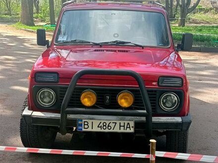 Красный ВАЗ 2121 Нива, объемом двигателя 1.7 л и пробегом 180 тыс. км за 3000 $, фото 1 на Automoto.ua