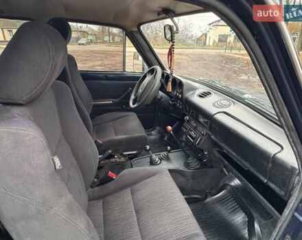 Синий ВАЗ 2121 Нива, объемом двигателя 1.57 л и пробегом 100 тыс. км за 1999 $, фото 11 на Automoto.ua