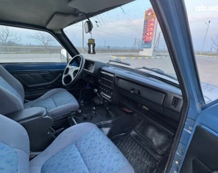 Синий ВАЗ 2121 Нива, объемом двигателя 1.7 л и пробегом 150 тыс. км за 3990 $, фото 7 на Automoto.ua