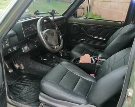 Зеленый ВАЗ 2121 Нива, объемом двигателя 1.6 л и пробегом 500 тыс. км за 5000 $, фото 1 на Automoto.ua