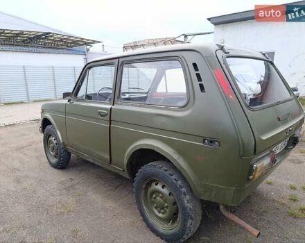 Зеленый ВАЗ 2121 Нива, объемом двигателя 1.6 л и пробегом 312 тыс. км за 850 $, фото 5 на Automoto.ua