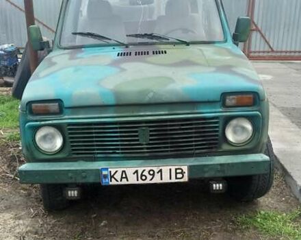 Зеленый ВАЗ 2121 Нива, объемом двигателя 1.6 л и пробегом 144 тыс. км за 1781 $, фото 1 на Automoto.ua