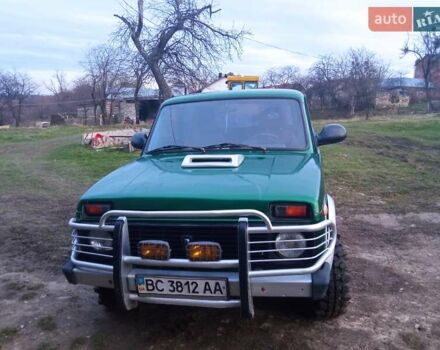 Зеленый ВАЗ 2121 Нива, объемом двигателя 1.7 л и пробегом 200 тыс. км за 2700 $, фото 1 на Automoto.ua