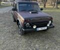 Красный ВАЗ 21213 Niva, объемом двигателя 1.69 л и пробегом 150 тыс. км за 2500 $, фото 1 на Automoto.ua