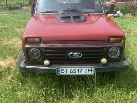 ВАЗ 21213 Niva 2001 у Миргороде на Automoto.ua Червоний ВАЗ 21213 Niva, об'ємом двигуна 1.7 л та пробігом 300 тис. км за 3000 $, фото 1 на Automoto.ua