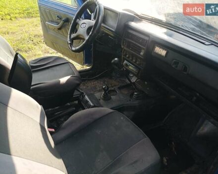 Синий ВАЗ 21213 Niva, объемом двигателя 1.69 л и пробегом 150 тыс. км за 100 $, фото 4 на Automoto.ua