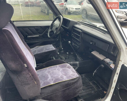 Білий ВАЗ 21214, об'ємом двигуна 1.7 л та пробігом 171 тис. км за 3300 $, фото 7 на Automoto.ua