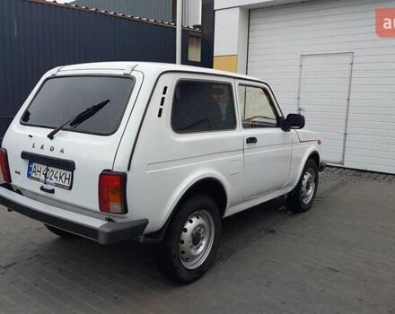 Белый ВАЗ 21214, объемом двигателя 1.69 л и пробегом 74 тыс. км за 5900 $, фото 1 на Automoto.ua