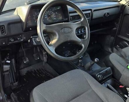 Черный ВАЗ 21214, объемом двигателя 1.69 л и пробегом 168 тыс. км за 4400 $, фото 6 на Automoto.ua