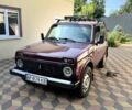 Красный ВАЗ 21214, объемом двигателя 1.7 л и пробегом 233 тыс. км за 3000 $, фото 1 на Automoto.ua