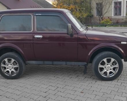 Красный ВАЗ 21214, объемом двигателя 1.7 л и пробегом 250 тыс. км за 3800 $, фото 3 на Automoto.ua