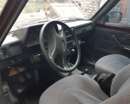 Красный ВАЗ 21214, объемом двигателя 1.7 л и пробегом 148 тыс. км за 3200 $, фото 5 на Automoto.ua