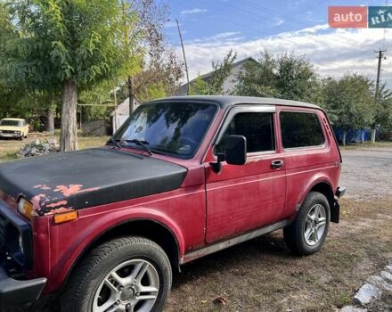 Красный ВАЗ 21214, объемом двигателя 1.7 л и пробегом 120 тыс. км за 2600 $, фото 4 на Automoto.ua