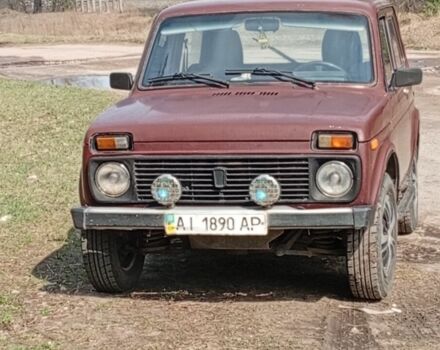 Красный ВАЗ 21214, объемом двигателя 7 л и пробегом 160 тыс. км за 3500 $, фото 1 на Automoto.ua