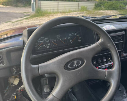 Красный ВАЗ 21214, объемом двигателя 1.7 л и пробегом 186 тыс. км за 4200 $, фото 20 на Automoto.ua