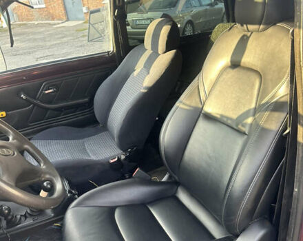 Красный ВАЗ 21214, объемом двигателя 1.7 л и пробегом 185 тыс. км за 4200 $, фото 13 на Automoto.ua