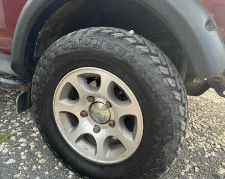 Красный ВАЗ 21214, объемом двигателя 1.7 л и пробегом 186 тыс. км за 4200 $, фото 13 на Automoto.ua