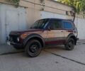 Красный ВАЗ 21214, объемом двигателя 1.7 л и пробегом 90 тыс. км за 2999 $, фото 1 на Automoto.ua