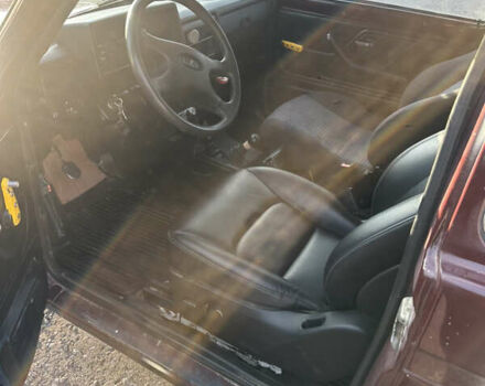 Красный ВАЗ 21214, объемом двигателя 1.7 л и пробегом 185 тыс. км за 4200 $, фото 12 на Automoto.ua